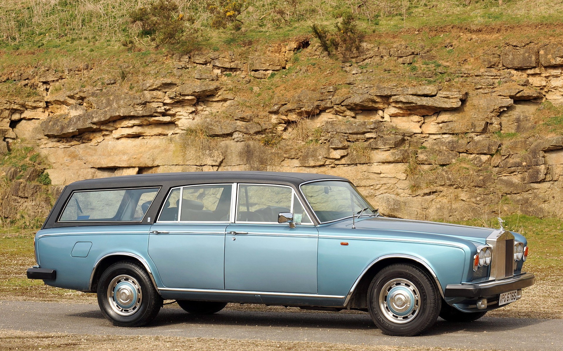 blue rolls-royce station wagon