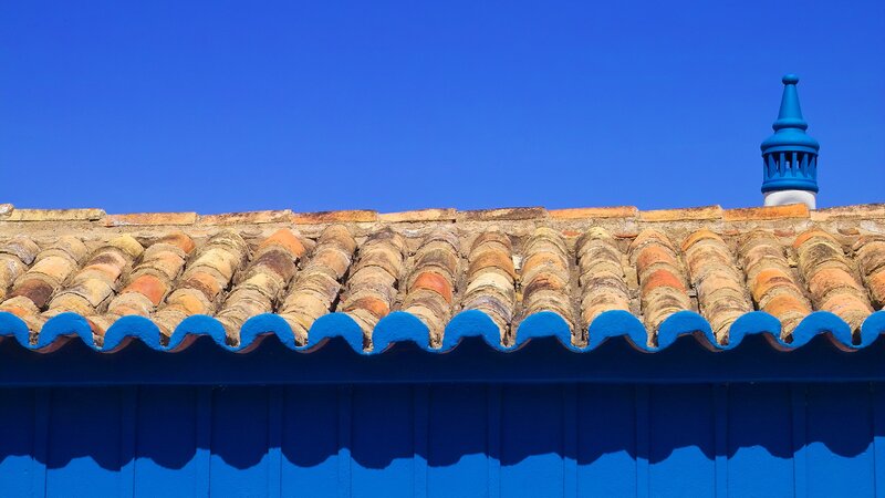 Blue roof against clear sky