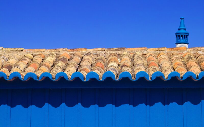 Blue roof tiles under clear sky