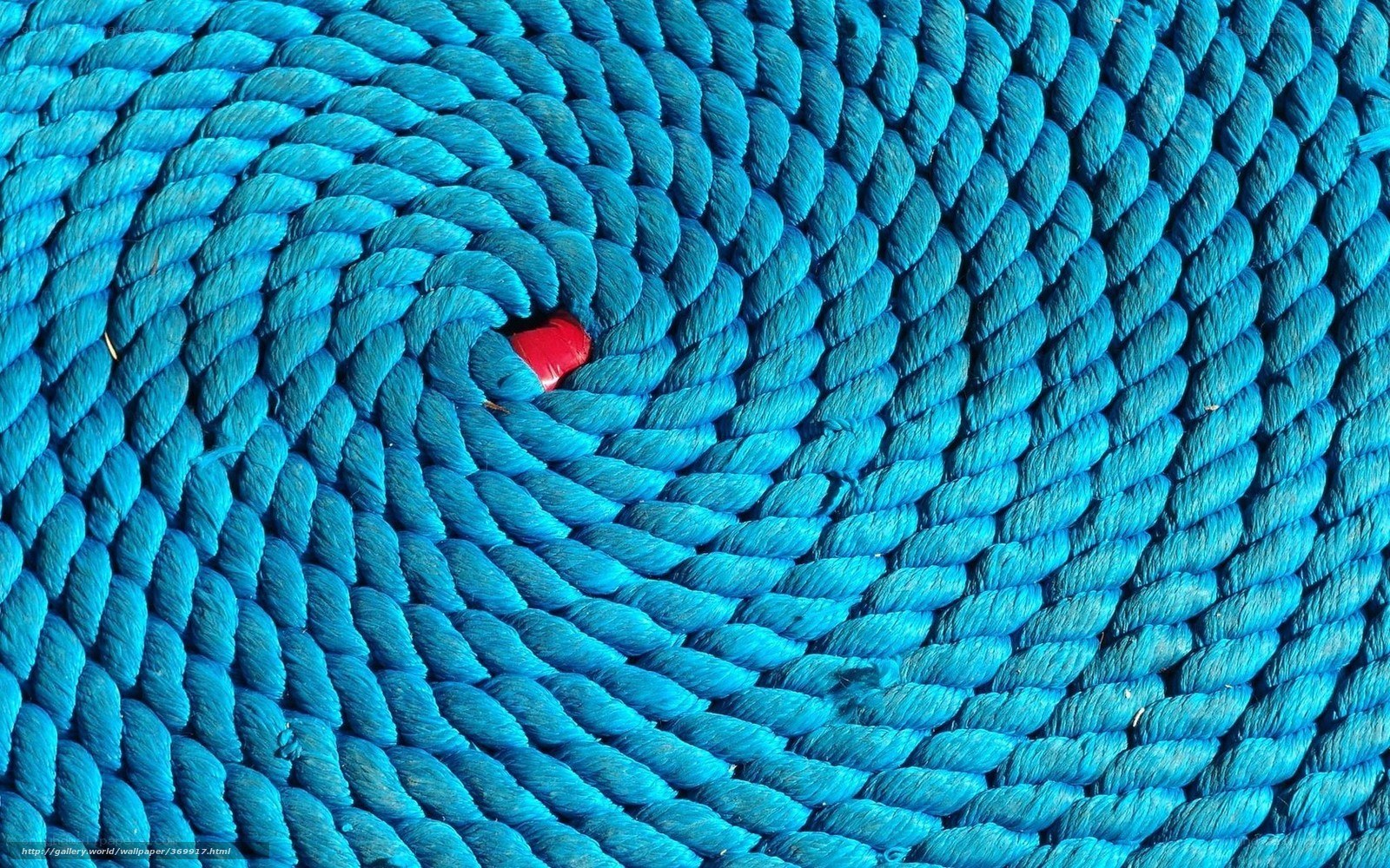 blue rope coil with red object