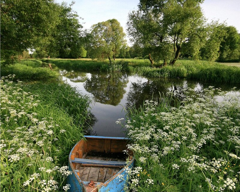 Blue Rowboat in River