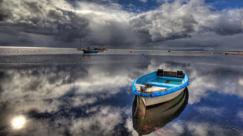Blue Rowboat in Water