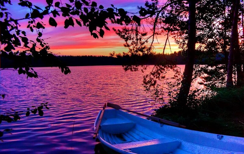 Blue Rowboat on Lake