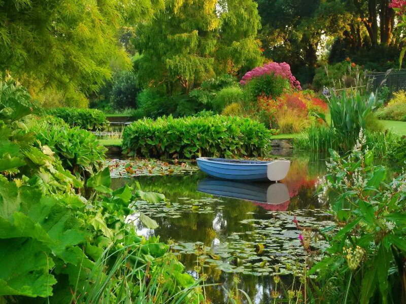 Blue Rowboat on Pond