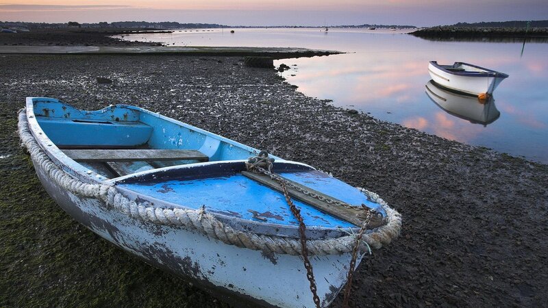 Blue Rowboat on Shore — Serene, Sunset, Photograph, Mudflat
