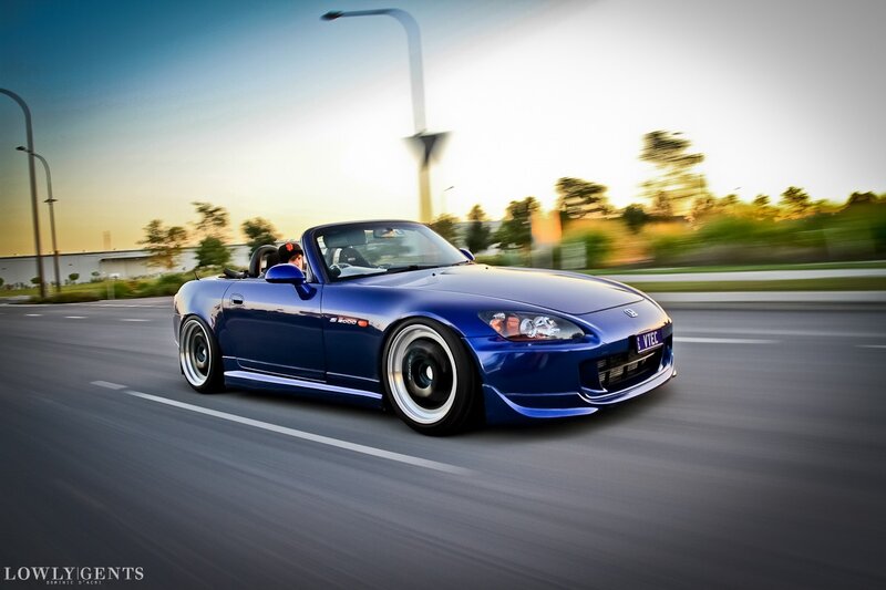 Blue S2000 convertible in motion