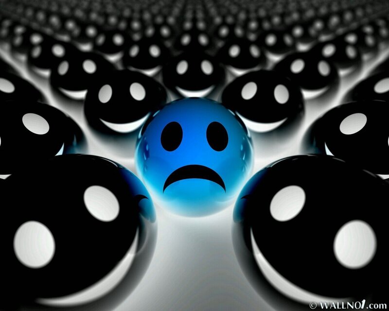 blue sad face among smiling faces