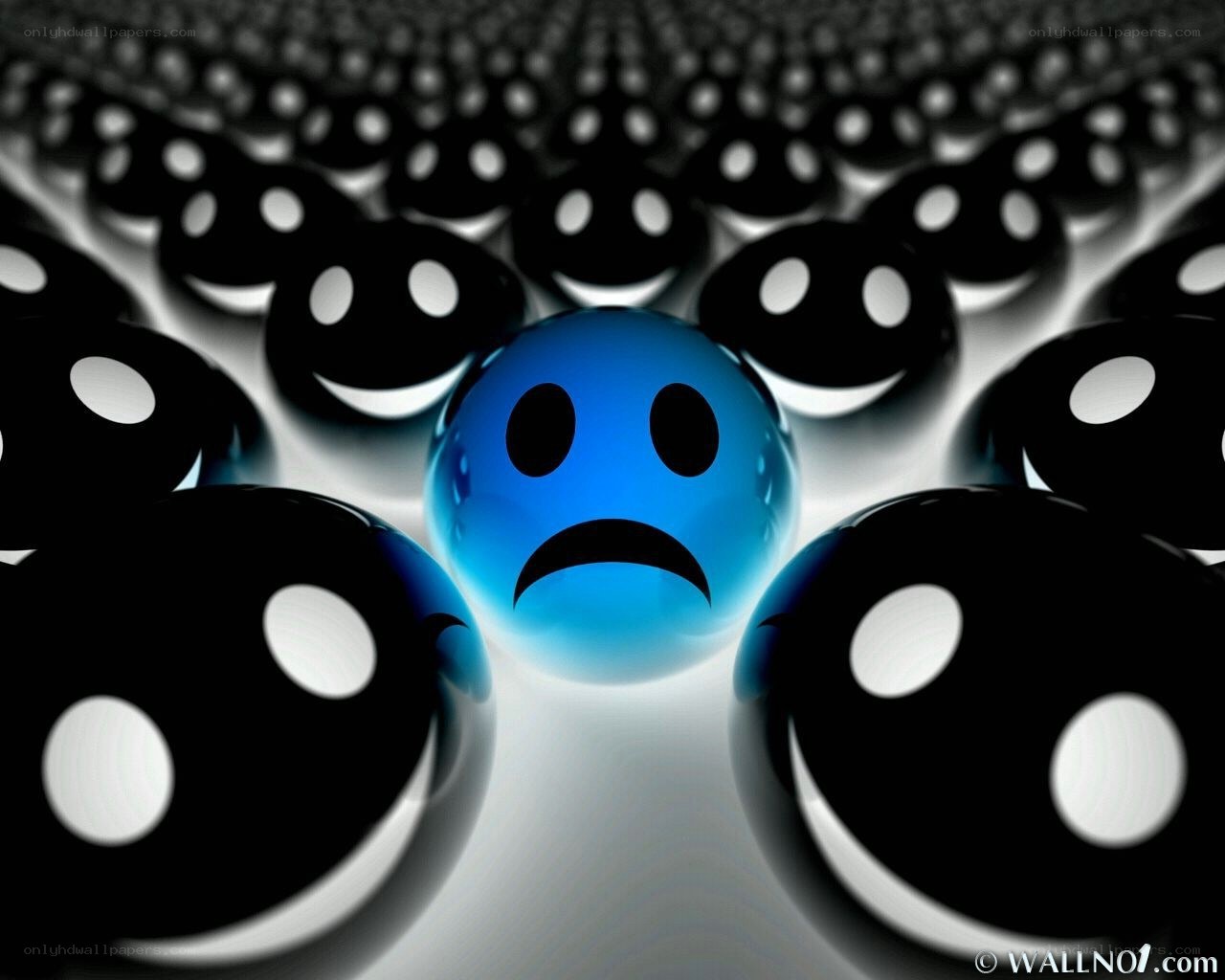 blue sad face among smiling faces