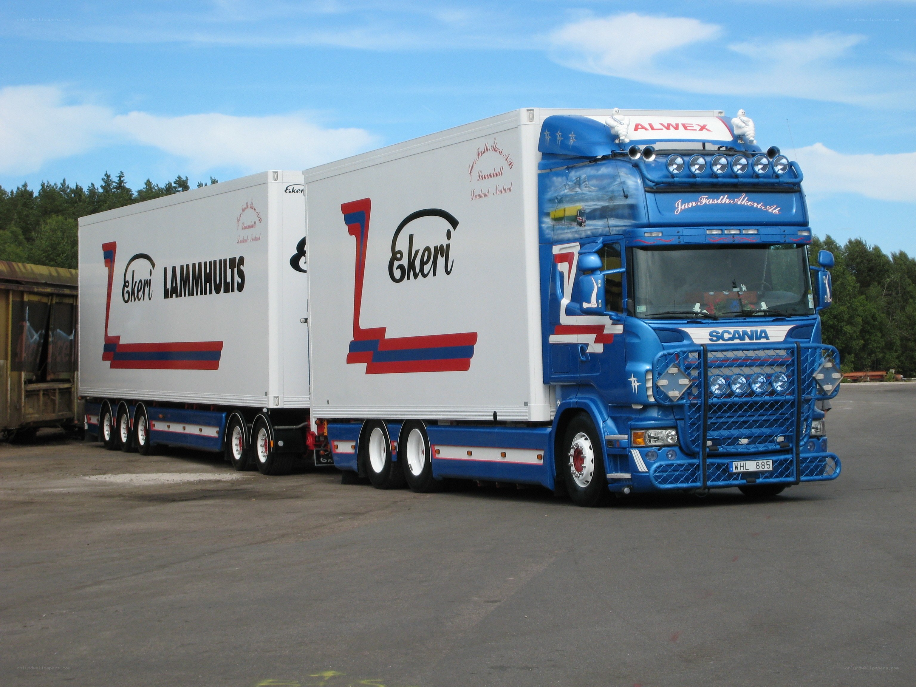 Blue Scania truck with trailers