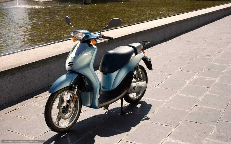 Blue scooter by a fountain