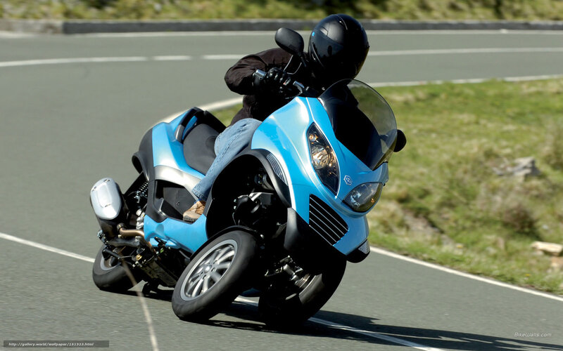 Blue scooter on a road