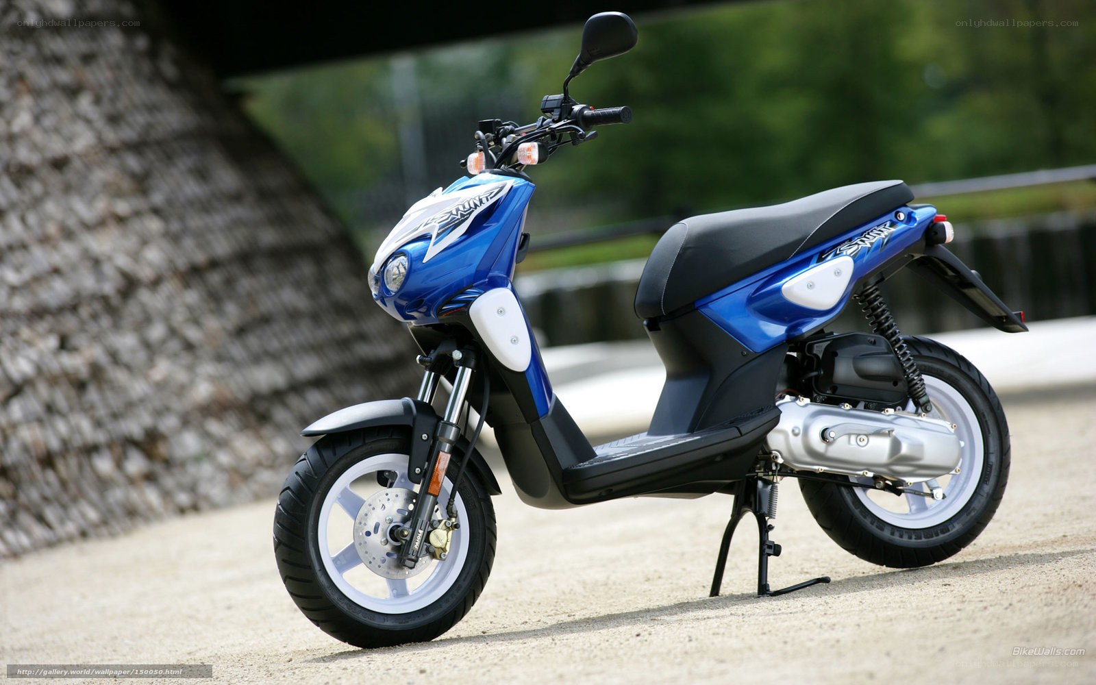 blue scooter parked outdoors