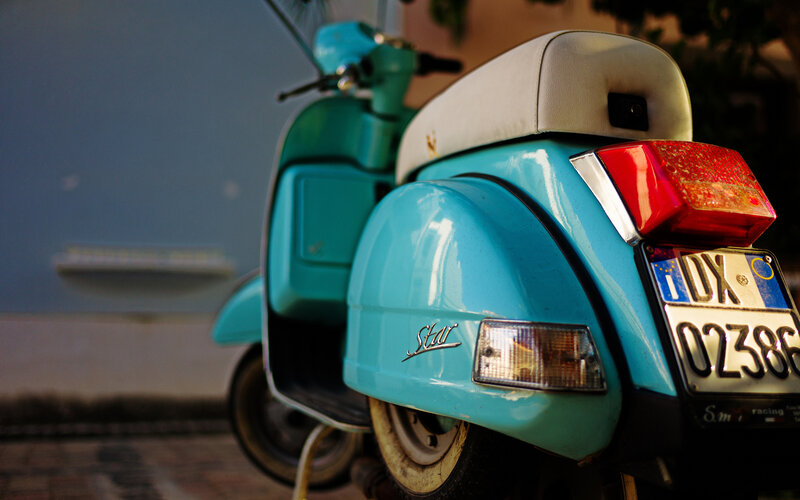 Blue Scooter Rear View — Cyan