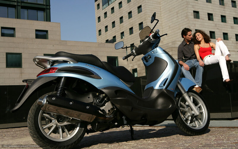 Blue Scooter with Couple