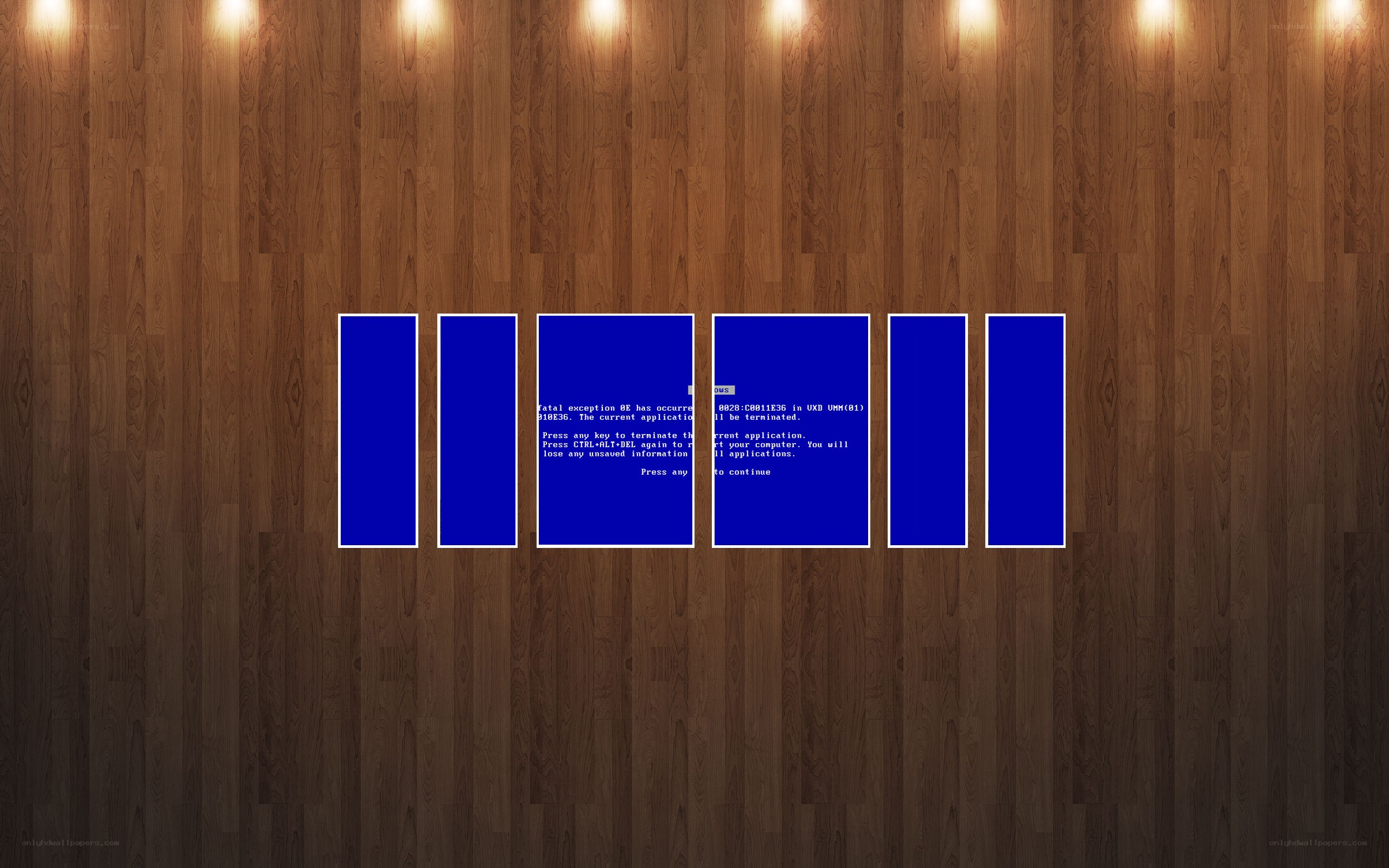 Blue screens on wood wall