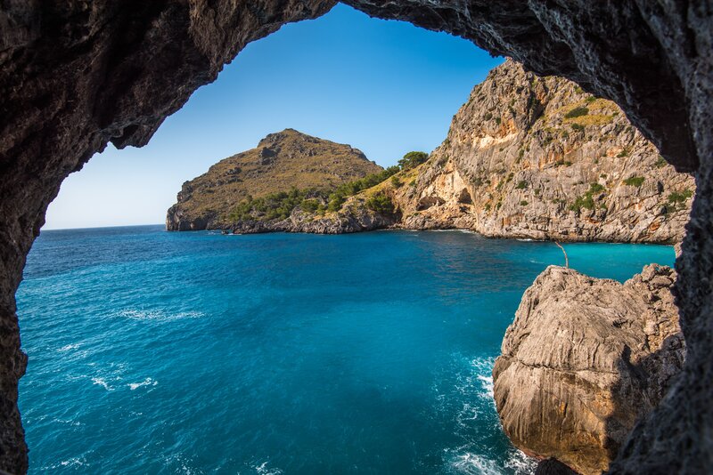 Blue Sea Through Cave Opening