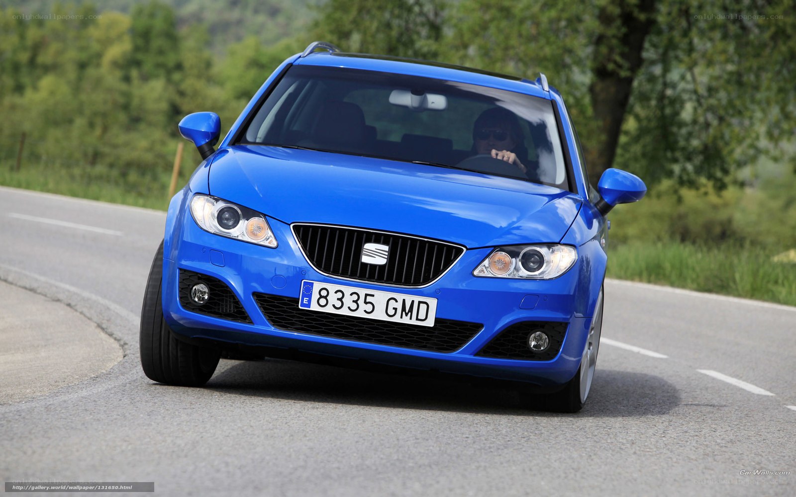 blue seat car on road