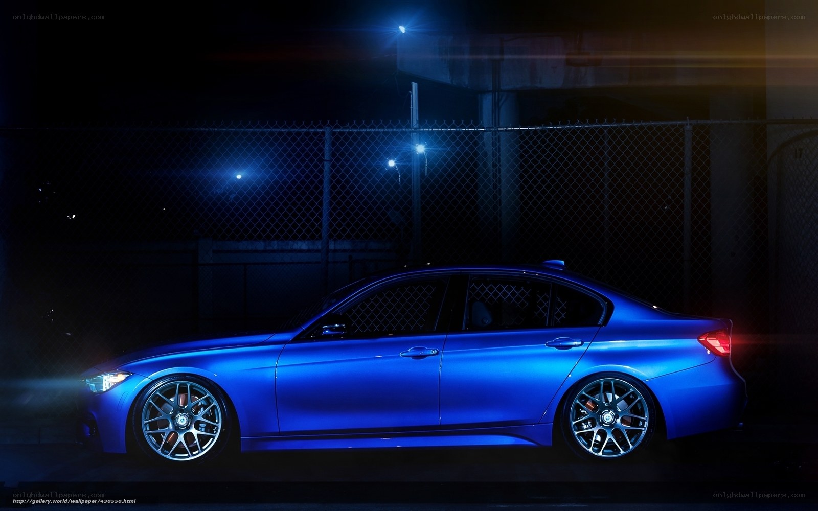blue sedan at night