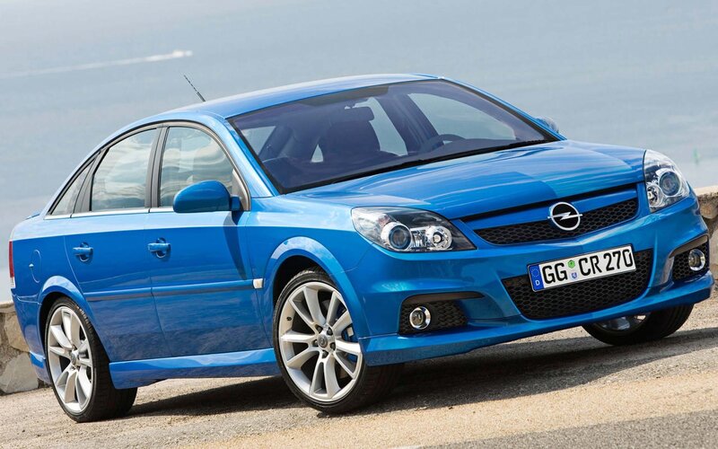 Blue Sedan Car — Calm, Afternoon, Photograph, Sea