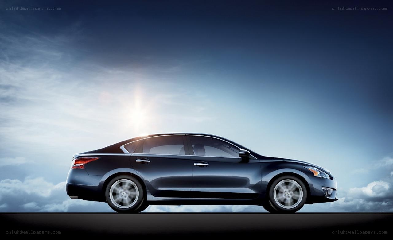blue sedan car in motion