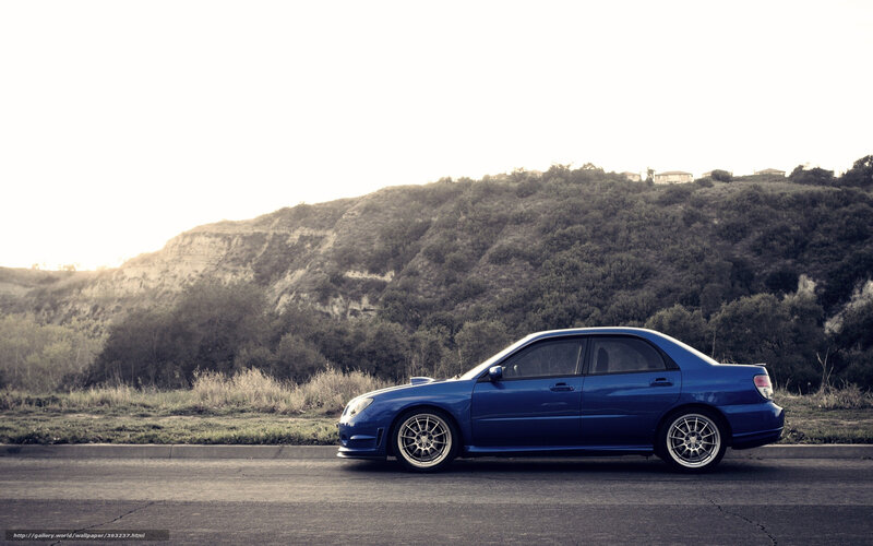 Blue Sedan Car — Serene, Sunset