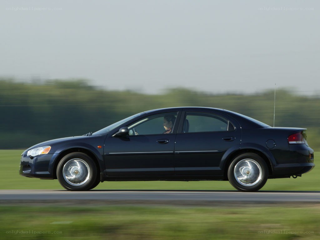 blue sedan in motion