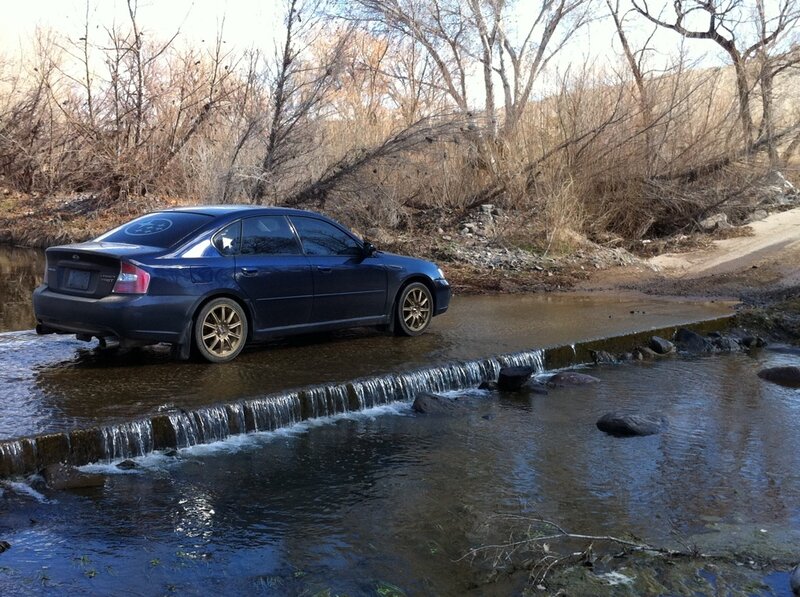 Blue Sedan in Stream