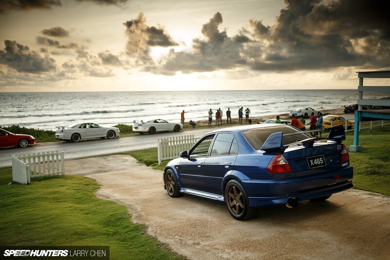 Blue Sedan on Beach