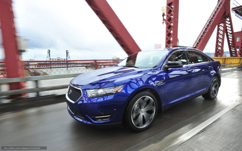 Blue Sedan on Bridge