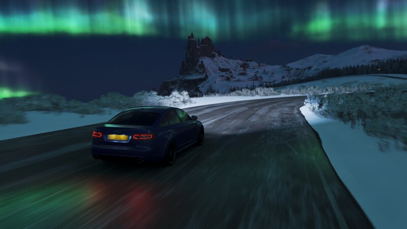 Blue Sedan on Road — Green