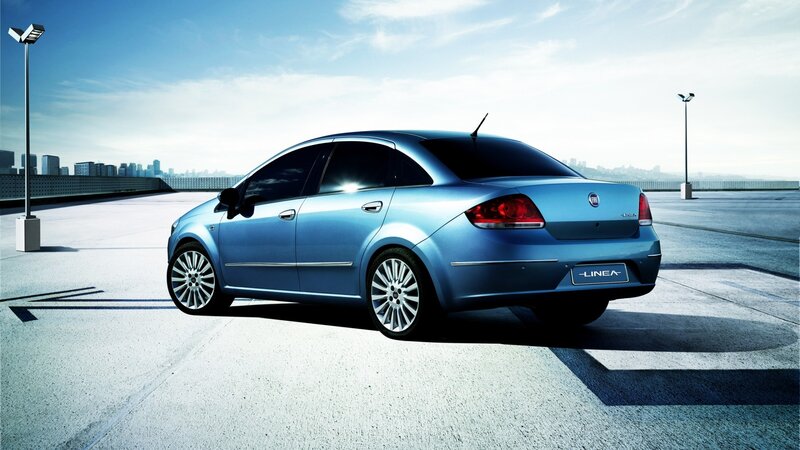 Blue sedan on rooftop
