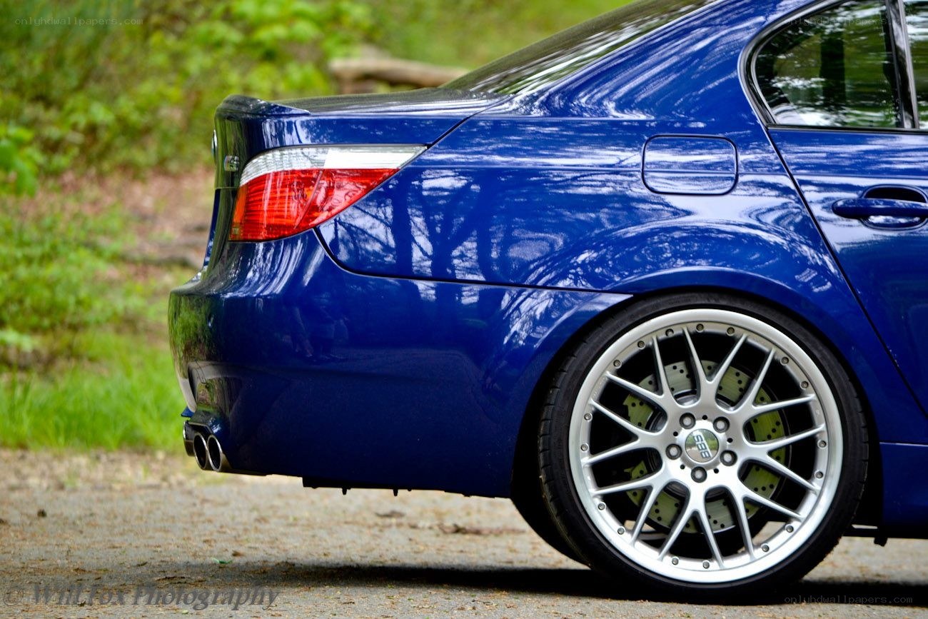 blue sedan rear view