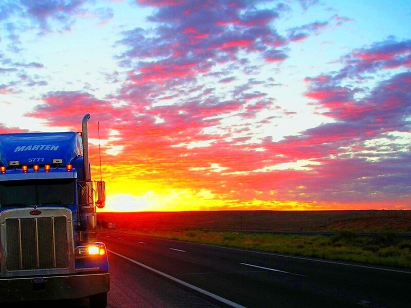 Blue Semi-truck on Highway — Red