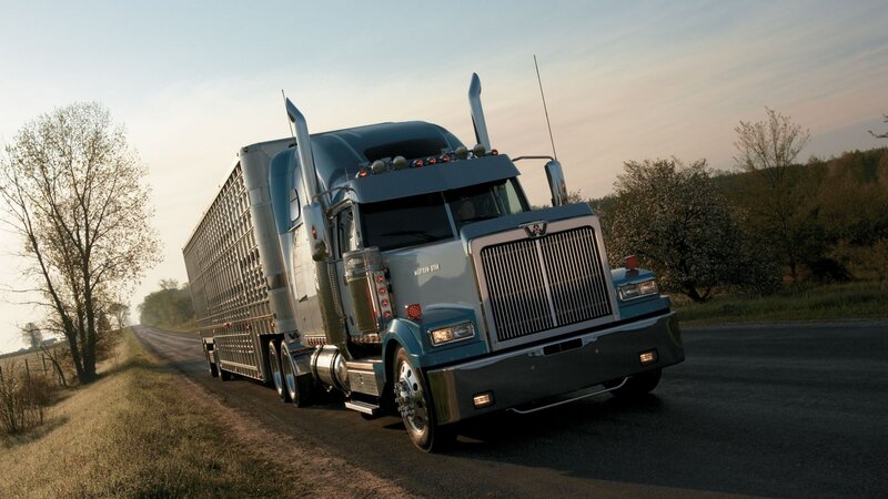 Blue Semi-truck on Road — Serene, Sunset