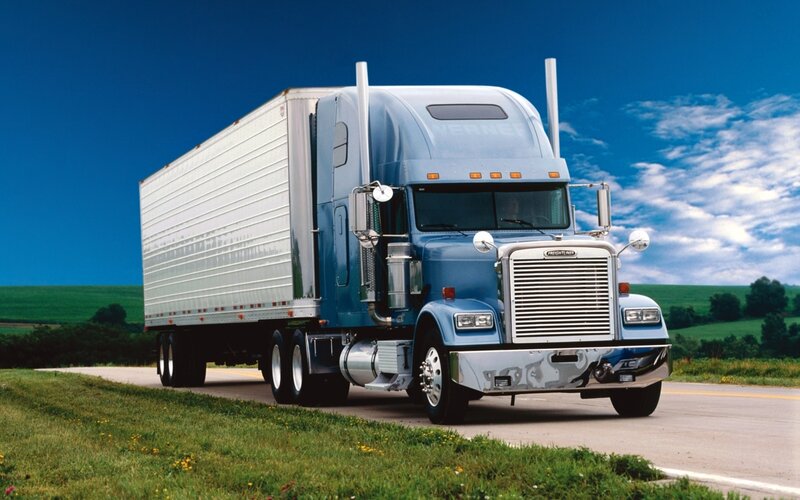 Blue Semi-truck on Road — Serene