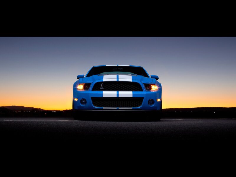 Blue Shelby Mustang at sunset