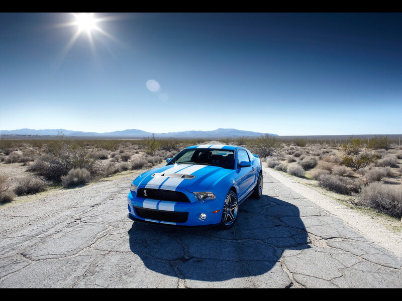 Blue Shelby Mustang in desert