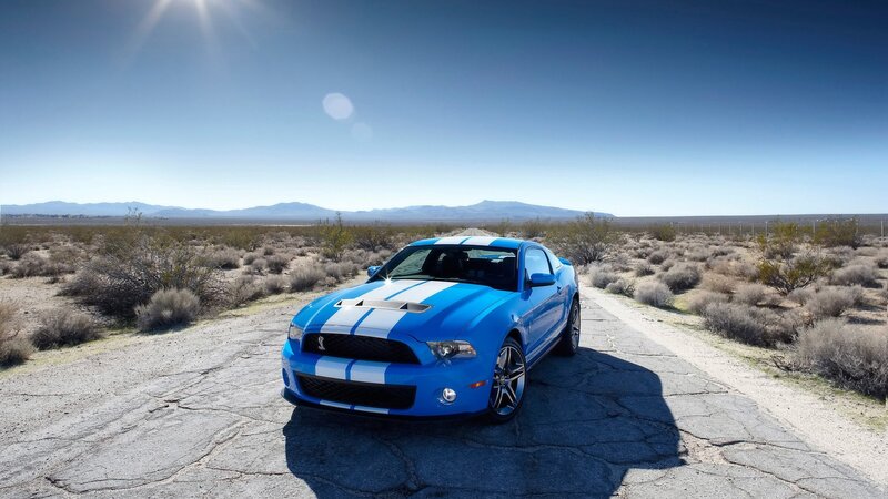 Blue Shelby Mustang in desert