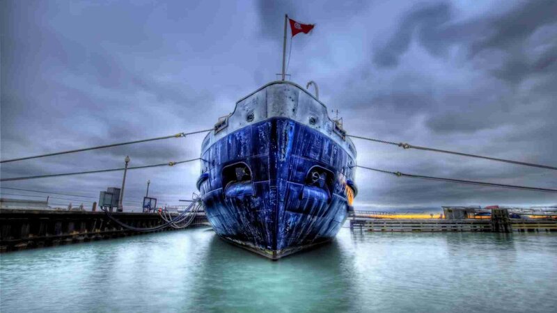 Blue Ship at Dock — Dramatic