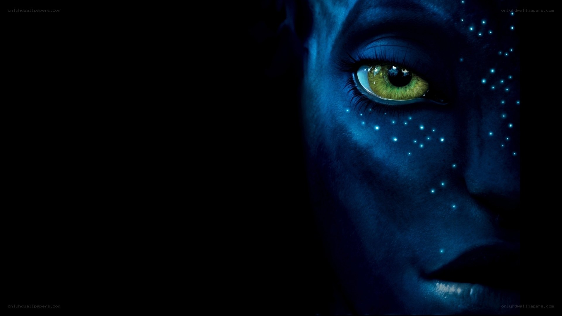 blue-skinned alien with glowing eyes