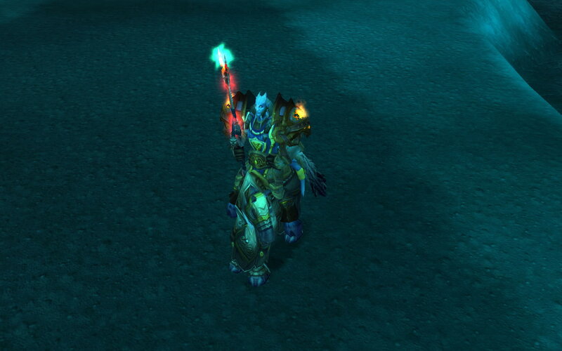 Blue-skinned Character Holding Staff