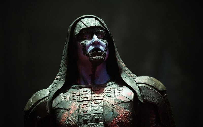 Blue-skinned Character in Armor — Black
