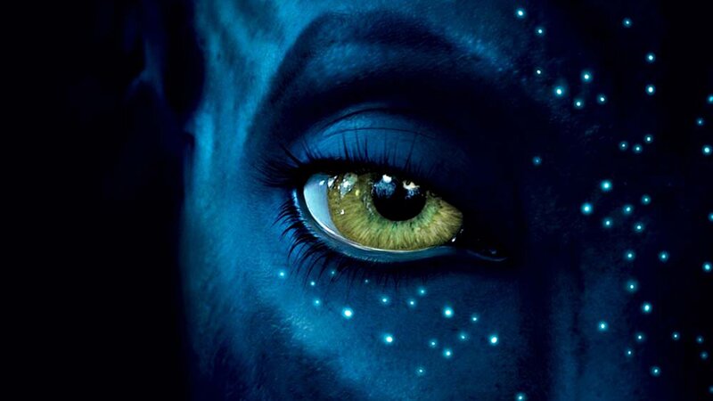blue-skinned eye with glowing dots