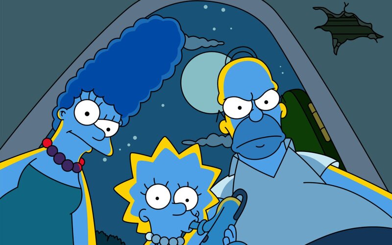 Blue-skinned Family in Car — Blue
