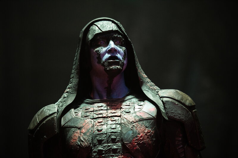 blue-skinned warrior in armor