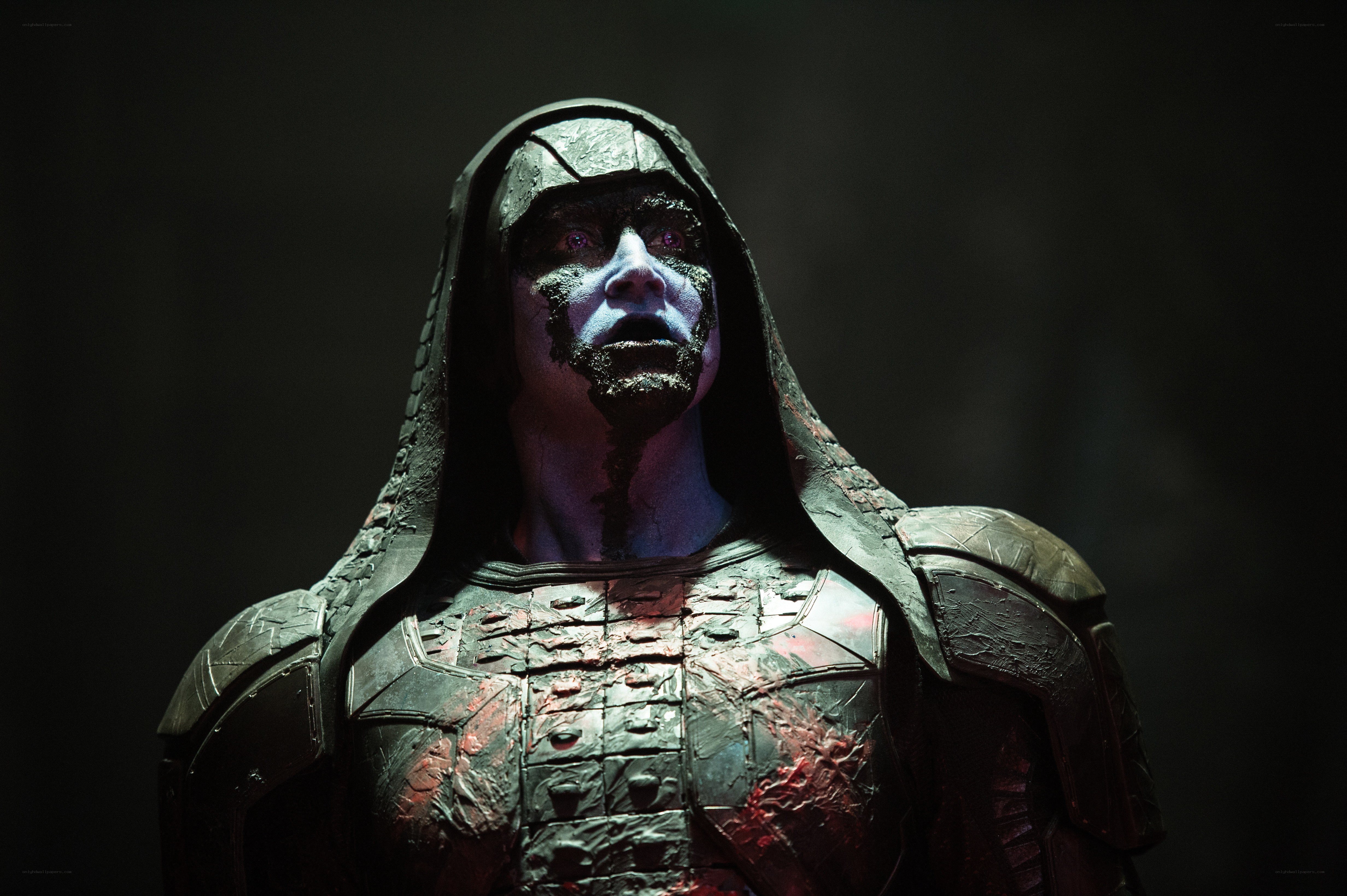 blue-skinned warrior in armor