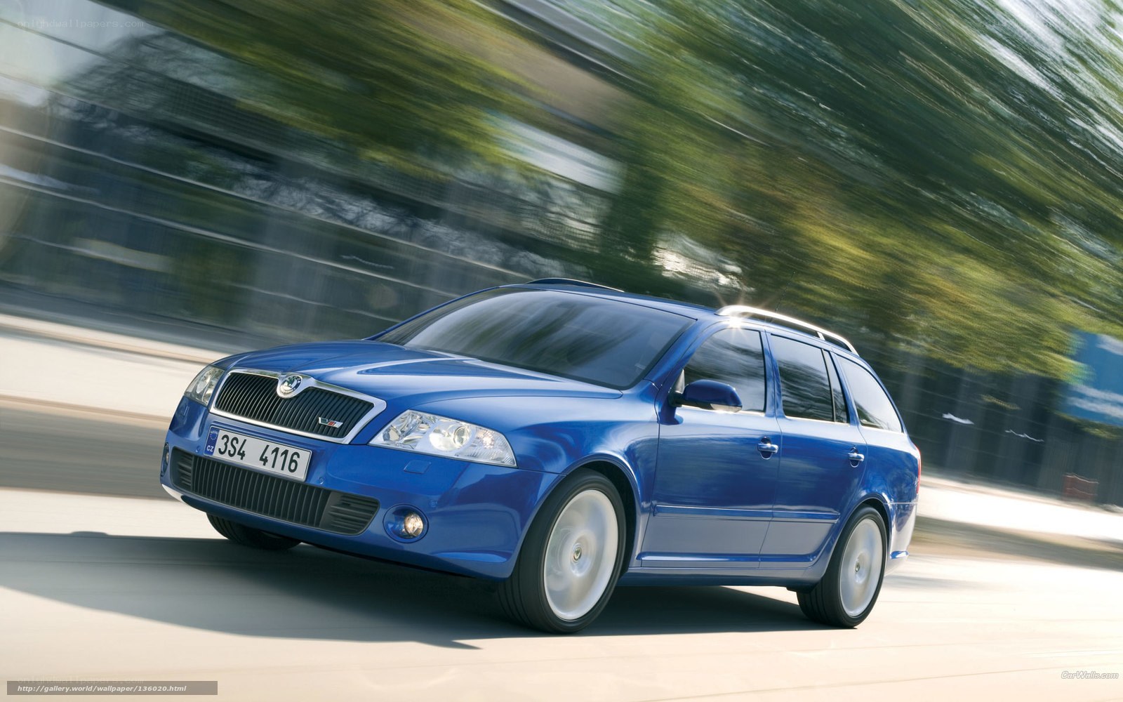 blue skoda octavia vrs in motion