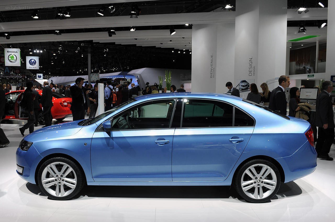 Blue Skoda sedan at auto show