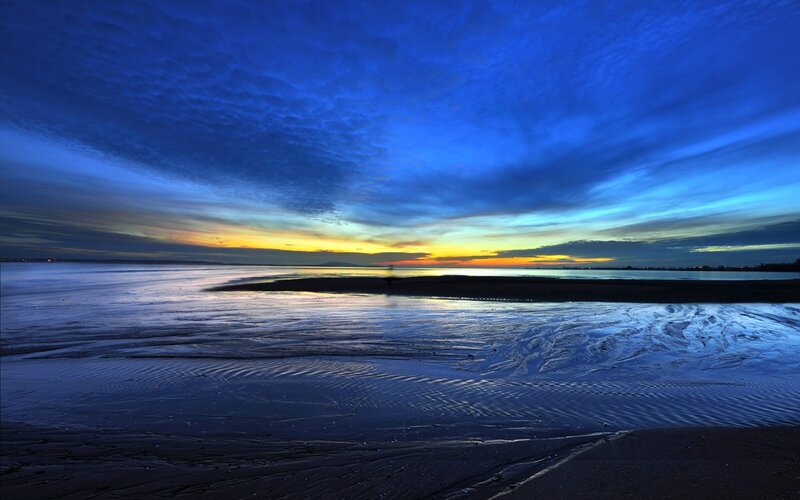 Blue sky at sunset over the beach