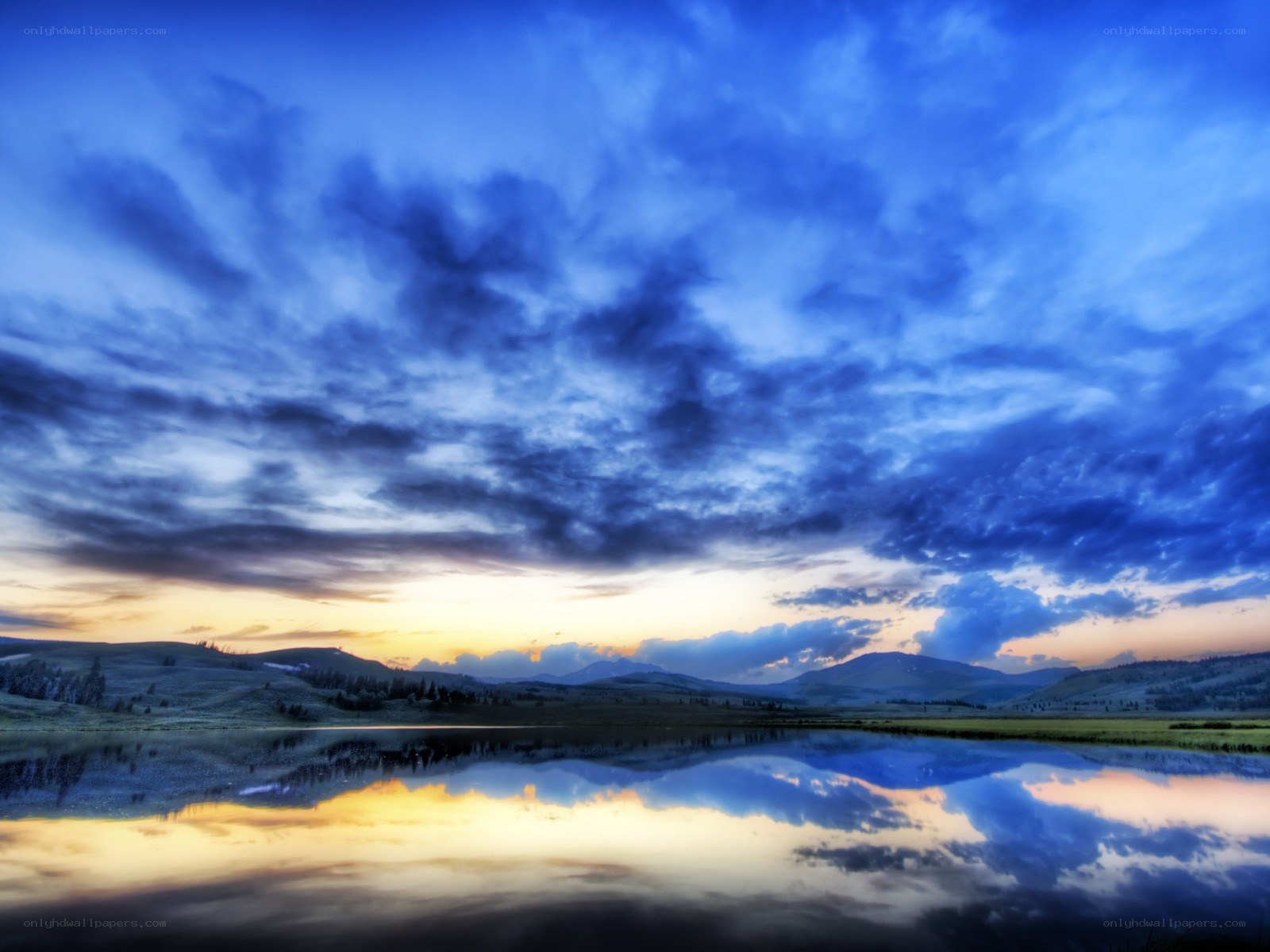 Blue sky over a calm lake
